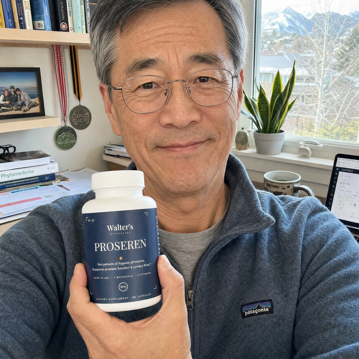 David R., 63, holding the Walter's PROSEREN saw palmetto bottle at his Boulder, Colorado home office — verified buyer review photo